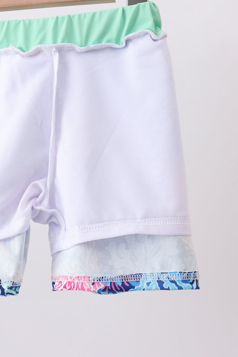 Blue marine creature print swim trunks